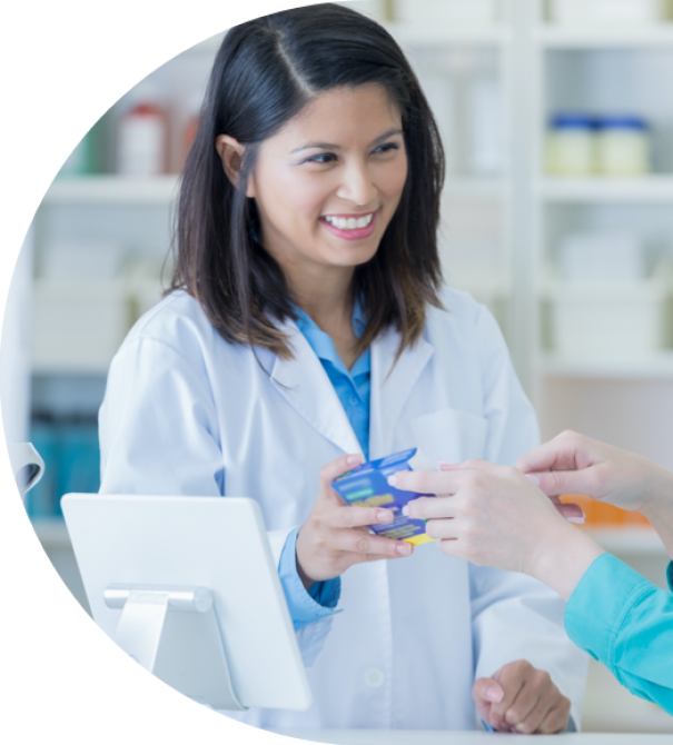 A pharmacist giving a medicine to a client A pharmacist giving a medicine to a client