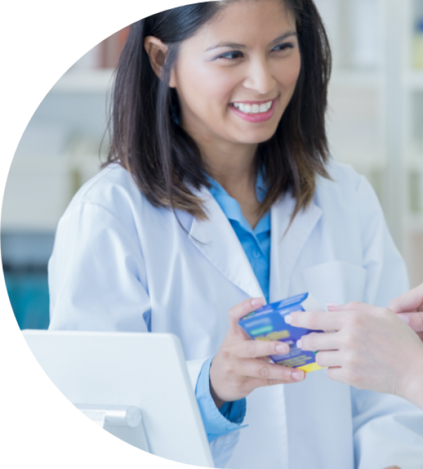 A pharmacist giving a medicine to a client