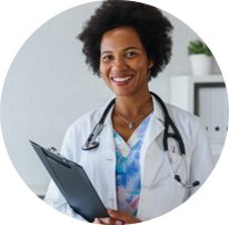 A doctor who is smilling with a stethoscope around her neck